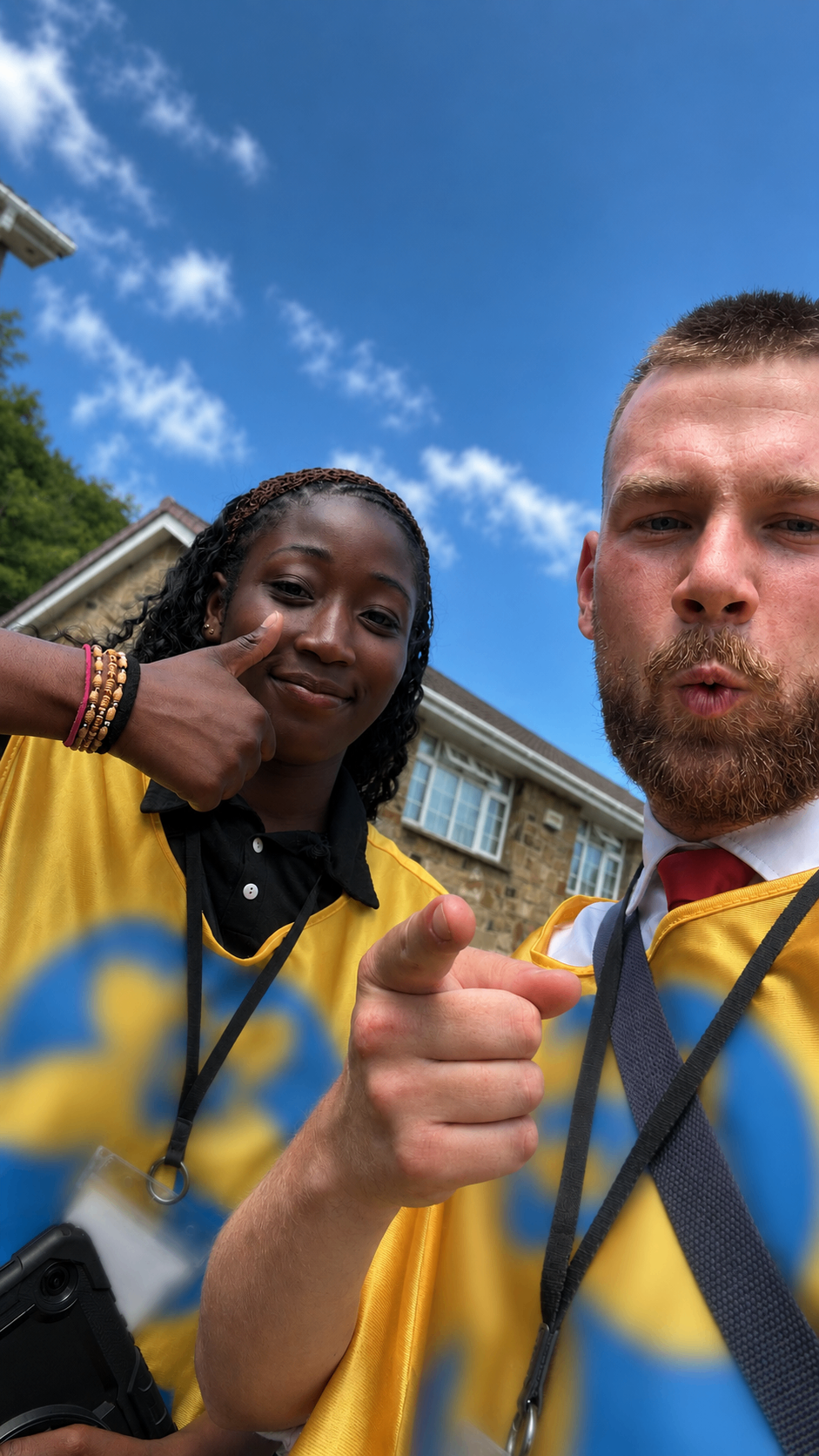 Team pair speaking to customers
